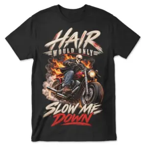 Black T-shirt front flatlay featuring a skull-headed motorcyclist, flames, and the words “SLOW ME DOWN”.