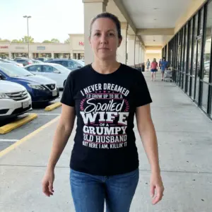 Spoiled Wife of a Grumpy Old Husband T-Shirt 11 Lifestyle product view featuring the spoiled wife of a grumpy old husband shirt graphic.