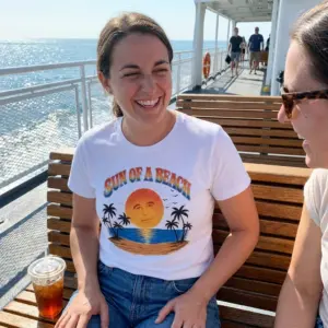 Sun Of A Beach Retro Sunset Island Palm Trees Pun T-Shirt 10 Everyday streetwear outfit styling white shirt with white tee front print reading SUN OF A BEACH in retro arch text over a tropical sunset island