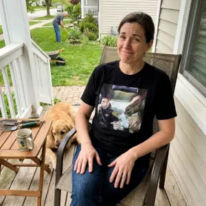 Surreal Officer and Smoking Horse Car Painting T-Shirt 10 Everyday streetwear outfit styling black shirt with black tee front print with a surreal oil painting of an officer and a horse smoking inside a car