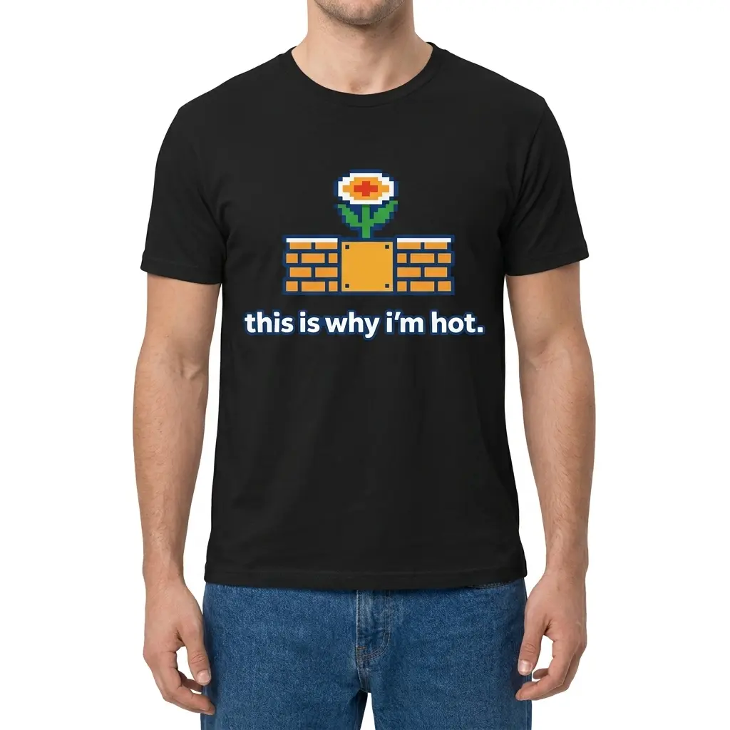This Is Why I'm Hot 8-Bit Retro Fire Flower T-Shirt 4 Man wearing black graphic tee with black tee front print reading this is why im hot below an 8-bit pixel fire flower on retro brick blocks