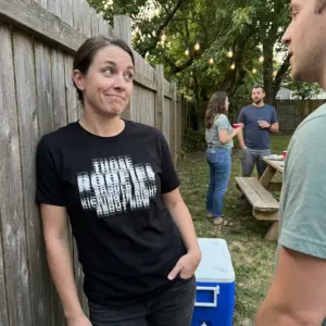 Those Roofies Should Be Kicking In Blurry Text Funny T-Shirt 11 Close-up casual look showcasing black tee and black tee front print reading THOSE ROOFIES SHOULD BE KICKING IN RIGHT ABOUT NOW in blurry layered text