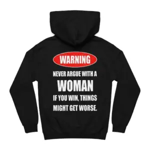 Warning Never Argue With A Woman Funny Marriage Humor Tee 7 Black hoodie back flatlay showing the red Warning badge and Never Argue With A Woman If You Win Things Might Get Worse text