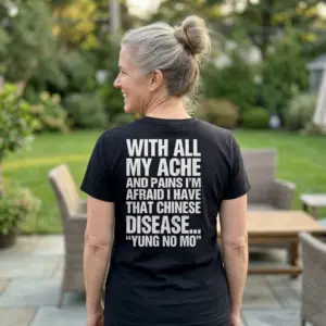 With All My Ache And Pains Yung No Mo Funny Getting Older T-Shirt 11 Close-up casual look showcasing black tee and black tee back print reading WITH ALL MY ACHE AND PAINS YUNG NO MO in distressed white block letters