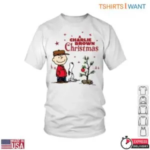 White Charlie Brown Snoopy Christmas T-Shirt flat lay showing Charlie Brown and Snoopy looking at the decorated sapling