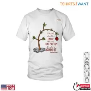 White Charlie Brown's Christmas Tree T-Shirt flat lay showing the leaning sapling with a red ornament over the quote