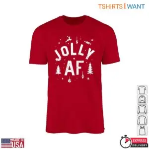 Christmas Motifs graphic on a red crew-neck t-shirt flat lay reading Jolly AF surrounded by white pine trees, ornaments, and a reindeer.