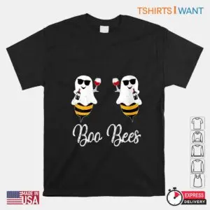 Black flat-lay crew neck t-shirt featuring two cartoon ghost bees wearing sunglasses and holding red wine glasses above cursive Boo Bees lettering