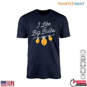 Led Christmas Lights graphic on a navy blue crew-neck t-shirt flat lay reading I Like Big Bulbs above four glowing yellow holiday bulbs.