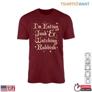 Maroon t-shirt with vintage cream typography reading I'm Eating Junk & Watching Rubbish surrounded by stars