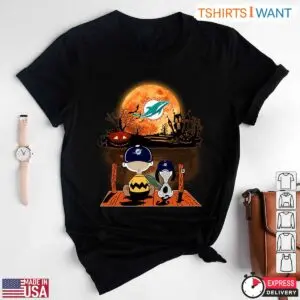 Miami Dolphins Snoopy Halloween T Shirt Charlie Brown and Snoopy Watching Dolphins Football Tee 1 1 1.jpg