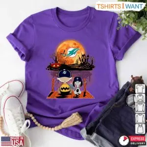 Miami Dolphins Snoopy Halloween T-Shirt – Charlie Brown and Snoopy Watching Dolphins Football Tee 14 Miami Dolphins Snoopy Halloween T Shirt Charlie Brown and Snoopy Watching Dolphins Football Tee 6 1 1.jpg
