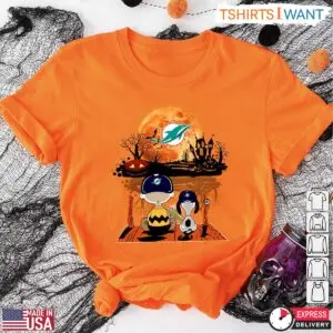 Miami Dolphins Snoopy Halloween T-Shirt – Charlie Brown and Snoopy Watching Dolphins Football Tee 17 Miami Dolphins Snoopy Halloween T Shirt Charlie Brown and Snoopy Watching Dolphins Football Tee 9 1 1.jpg